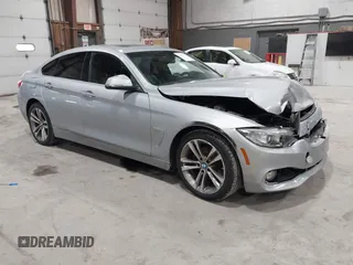 2016 BMW 4 Series 428i xDrive with VIN WBA4C9C5XGG138843, listed as a IAAI auction lot 41747358 with 63,804 mi miles and . Bid and sale history available at carsss.com. Image 1.