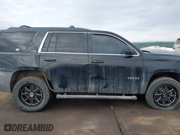 2017 Chevrolet Tahoe LT with VIN 1GNSKBKC7HR178685, listed as a IAAI auction lot 41466840 with 163,610 mi miles and . Bid and sale history available at DreamBid. Image 13.