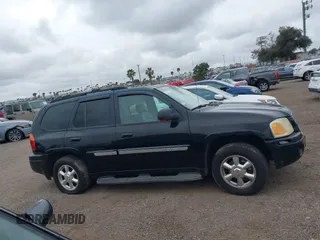 2003 GMC Envoy SLT z VIN 1GKDS13S232298062, wystawiony jako IAAI lot #41668380 z przebiegiem 195 045 mil mil oraz . Historia ofert i sprzedaży dostępna na DreamBid. Obrazek 13.