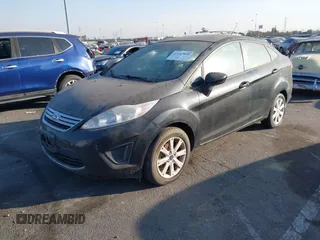 2011 Ford Fiesta SE with VIN 3FADP4BJ1BM216925, listed as a IAAI auction lot 41407030 with 108,459 mi miles. Bid and sale history available at carsss.com. Image 2.