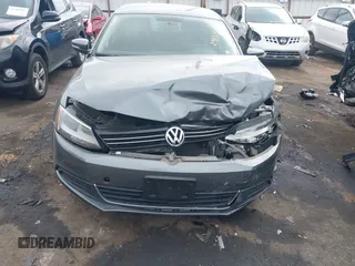 2014 Volkswagen Jetta SE z VIN 3VWD17AJ9EM298175, wystawiony jako IAAI lot #42084756 z przebiegiem 93 039 mil mil oraz . Historia ofert i sprzedaży dostępna na DreamBid. Obrazek 6.