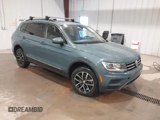 2021 Volkswagen Tiguan SE with VIN 3VV2B7AX6MM077337, listed as a IAAI auction lot 41345637 with 62,989 mi miles and . Bid and sale history available at DreamBid. Image 1.