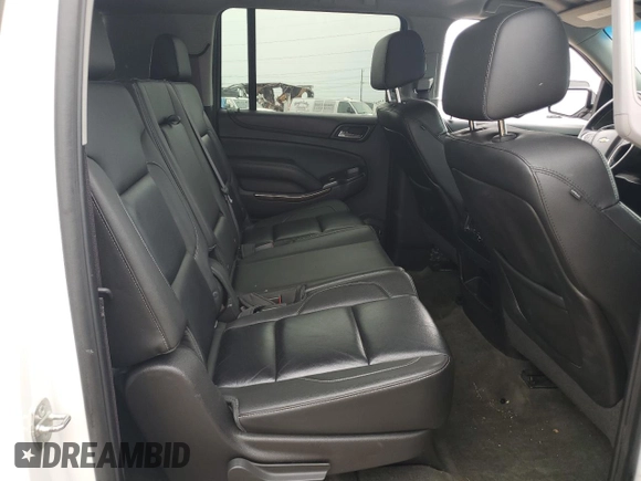 2015 Chevrolet Suburban LT z VIN 1GNSKJKC5FR261474, wystawiony jako Copart lot #60679775 z przebiegiem 128 851 mil mil oraz Czysty tytuł • Clean title. Historia ofert i sprzedaży dostępna na DreamBid. Obrazek 11.