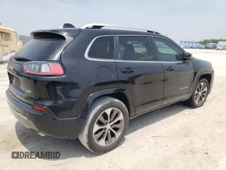2019 Jeep Cherokee z VIN 1C4PJLJN0KD215834, wystawiony jako Copart lot #57652975 z przebiegiem 127 986 mil mil oraz Czysty tytuł • Clean title. Historia ofert i sprzedaży dostępna na DreamBid. Obrazek 3.