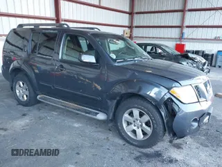 2011 Nissan Pathfinder LE z VIN 5N1AR1NB1BC616913, wystawiony jako IAAI lot #40627326 z przebiegiem 119 372 mil mil oraz . Historia ofert i sprzedaży dostępna na DreamBid. Obrazek 1.
