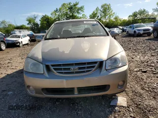2006 Kia Spectra EX z VIN KNAFE121365269433, wystawiony jako Copart lot #56634735 z przebiegiem 86 551 mil mil oraz Szkoda całkowita • Salvage title. Historia ofert i sprzedaży dostępna na DreamBid. Obrazek 5.