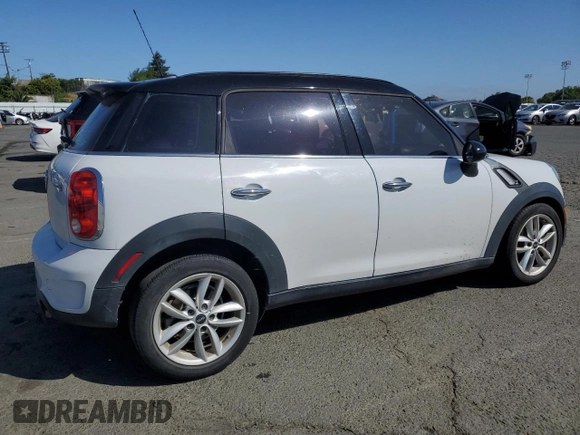 2014 MINI Countryman S with VIN WMWZC3C5XEWP25792, listed as a Copart auction lot 58583455 with 83,831 mi miles and Salvage title. Bid and sale history available at DreamBid. Image 3.