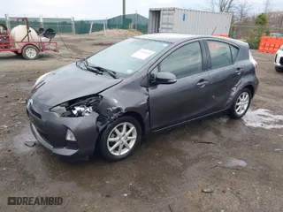 2013 Toyota Prius c One with VIN JTDKDTB31D1531200, listed as a IAAI auction lot 41685835 with 128,996 mi miles. Bid and sale history available at carsss.com. Image 2.
