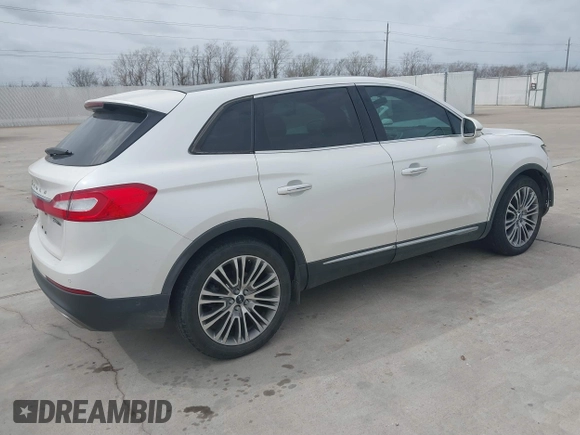 2016 Lincoln MKX Reserve with VIN 2LMPJ6LP8GBL33580, listed as a IAAI auction lot 41749632 with 100,579 mi miles. Bid and sale history available at carsss.com. Image 4.