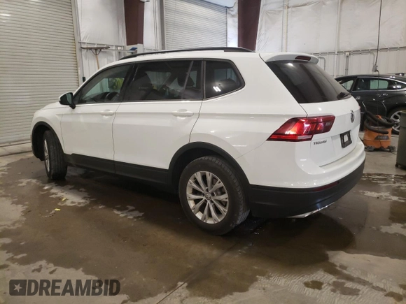 2018 Volkswagen Tiguan S with VIN 3VV1B7AX4JM118670, listed as a Copart auction lot 57055935 with 104,443 mi miles and Salvage title. Bid and sale history available at DreamBid. Image 2.