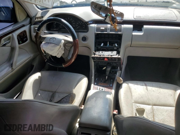 2001 Mercedes-Benz E-Class AWD with VIN WDBJF82J21X056553, listed as a Copart auction lot 73046694 with 0 mi miles and Salvage Title. Bid and sale history available at carsss.com. Image 8.