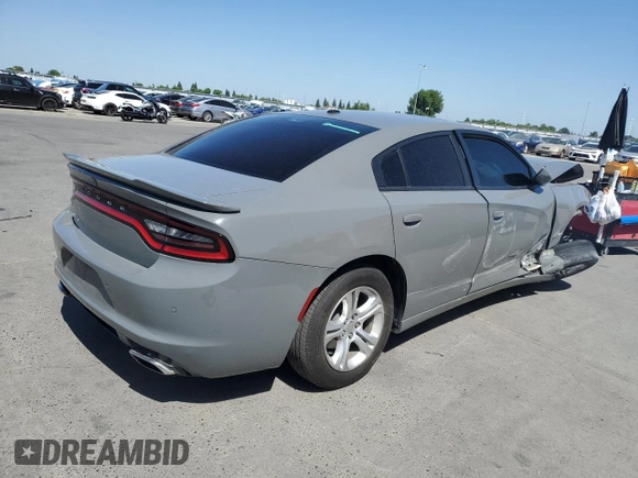 2019 Dodge Charger SXT with VIN 2C3CDXBGXKH659890, listed as a Copart auction lot 58011735 with 112,293 mi miles and Salvage title. Bid and sale history available at DreamBid. Image 3.