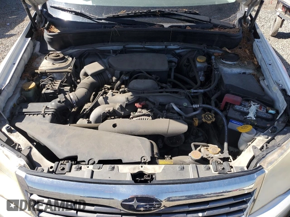 2010 Subaru Forester X with VIN JF2SH6AC0AH743775, listed as a Copart auction lot 60884835 with 127,481 mi miles and Salvage title. Bid and sale history available at DreamBid. Image 12.