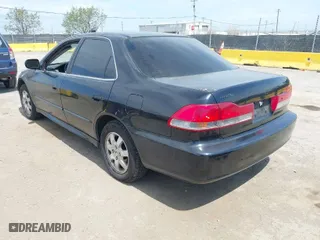 2002 Honda Accord Sdn SE with VIN 1HGCG66802A130514, listed as a IAAI auction lot 42053889 with 326,434 mi miles. Bid and sale history available at carsss.com. Image 3.