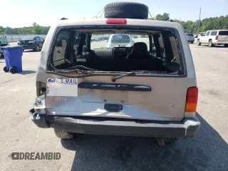 2000 Jeep Cherokee with VIN 1J4FN28S6YL210944, listed as a Copart auction lot 65163475 with 147,609 mi miles and Salvage title. Bid and sale history available at DreamBid. Image 6.