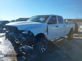 2014 Ram 2500 Tradesman with VIN 3C6TR5HT4EG243352, listed as a IAAI auction lot 41405714 with 232,346 mi miles. Bid and sale history available at carsss.com. Image 2.