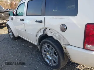 2007 Dodge Nitro R/T with VIN 1D8GU58647W656977, listed as a IAAI auction lot 41508811 with 286,570 mi miles. Bid and sale history available at carsss.com. Image 6.