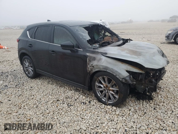 2020 Mazda CX-5 Grand Touring with VIN JM3KFADM9L1783156, listed as a Copart auction lot 42827565 with Not Provided miles and Salvage Title. Bid and sale history available at DreamBid. Image 4.