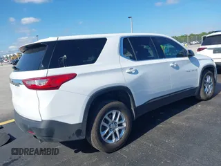 2021 Chevrolet Traverse LS with VIN 1GNERFKW0MJ240592, listed as a IAAI auction lot 42310680 with 59,986 mi miles and . Bid and sale history available at DreamBid. Image 4.