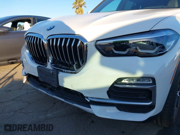 2021 BMW X5 sDrive40i with VIN 5UXCR4C03M9G59554, listed as a IAAI auction lot 41358056 with 47,577 mi miles. Bid and sale history available at carsss.com. Image 18.