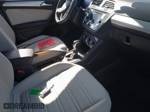 2024 Volkswagen Tiguan S with VIN 3VVFB7AX7RM063715, listed as a IAAI auction lot 41974650 with 23,374 mi miles and . Bid and sale history available at DreamBid. Image 5.