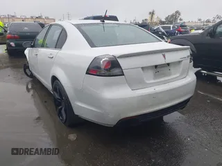 2009 Pontiac G8 GT with VIN 6G2EC57Y99L231004, listed as a IAAI auction lot 41572279 with 104,532 mi miles. Bid and sale history available at carsss.com. Image 3.