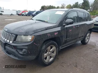 2014 Jeep Compass Latitude with VIN 1C4NJDEB2ED698213, listed as a IAAI auction lot 41997204 with 97,893 mi miles. Bid and sale history available at carsss.com. Image 2.