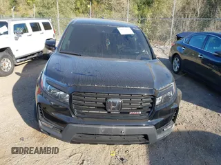 2023 Honda Ridgeline Sport z VIN 5FPYK3F1XPB033766, wystawiony jako IAAI lot #40557075 z przebiegiem Nie podano mil oraz . Historia ofert i sprzedaży dostępna na DreamBid. Obrazek 11.