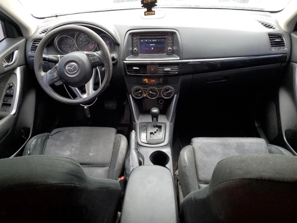 2013 Mazda CX-5 Sport z VIN JM3KE4BE4D0147672, wystawiony jako Copart lot #61617215 z przebiegiem 264 421 mil mil oraz Czysty tytuł • Clean title. Historia ofert i sprzedaży dostępna na DreamBid. Obrazek 8.