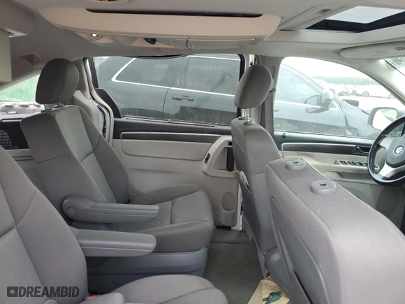 2009 Volkswagen Routan SE with VIN 2V8HW34139R582544, listed as a Copart auction lot 74354054 with 136,528 mi miles and Salvage Title. Bid and sale history available at carsss.com. Image 11.