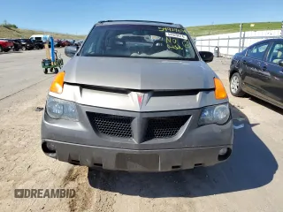 2001 Pontiac Aztek z VIN 3G7DB03E71S540232, wystawiony jako Copart lot #54929674 z przebiegiem 227 859 mil mil oraz Szkody całkowita. Historia ofert i sprzedaży dostępna na DreamBid. Obrazek 5.