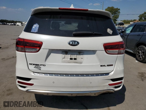 2016 Kia Sorento SXL with VIN 5XYPK4A10GG055107, listed as a Copart auction lot 69177304 with 138,300 mi miles and Salvage Title. Bid and sale history available at carsss.com. Image 6.