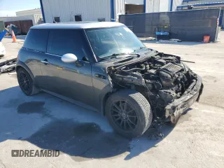 2006 MINI Hardtop S with VIN WMWRE33596TJ33149, listed as a Copart auction lot 43462805 with Not Provided miles and Salvage Title. Bid and sale history available at DreamBid. Image 4.