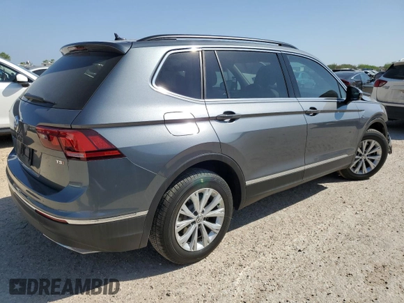 2018 Volkswagen Tiguan SEL with VIN 3VV3B7AX3JM010677, listed as a Copart auction lot 50615395 with 7,559 mi miles and Salvage Title. Bid and sale history available at DreamBid. Image 3.