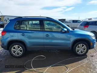 2017 Volkswagen Tiguan S with VIN WVGBV7AX4HK029852, listed as a IAAI auction lot 41654651 with 37,759 mi miles and . Bid and sale history available at DreamBid. Image 14.