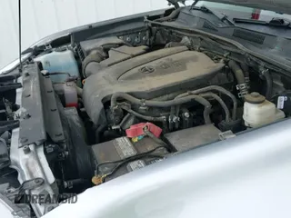 2022 Toyota Tacoma SR with VIN 3TMCZ5AN7NM470623, listed as a IAAI auction lot 42784781 with 97,728 mi miles and . Bid and sale history available at DreamBid. Image 20.