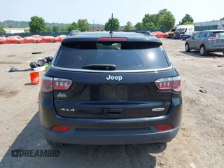 2018 Jeep Compass Latitude with VIN 3C4NJDBB1JT191490, listed as a IAAI auction lot 42429761 with 61,100 mi miles and . Bid and sale history available at DreamBid. Image 16.