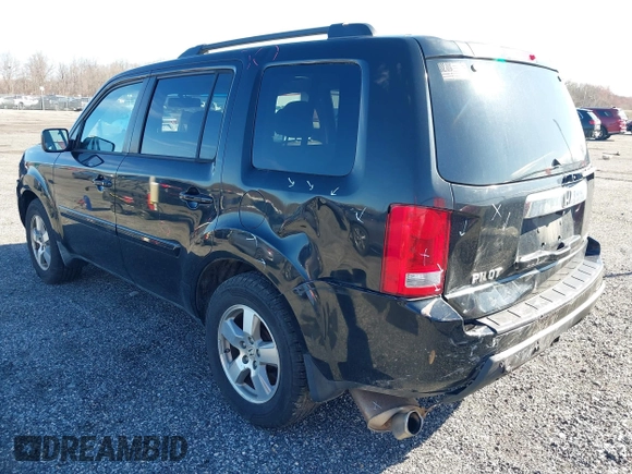 2011 Honda Pilot EX-L with VIN 5FNYF4H65BB004213, listed as a IAAI auction lot 41867681 with 157,644 mi miles and . Bid and sale history available at carsss.com. Image 3.