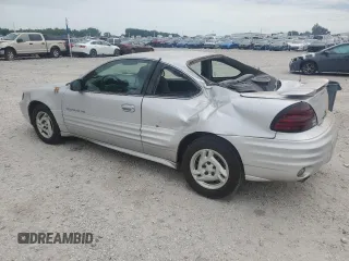 2001 Pontiac Grand Am with VIN 1G2NE12TX1M668035, listed as a Copart auction lot 59700585 with 60,965 mi miles and Salvage title. Bid and sale history available at DreamBid. Image 2.
