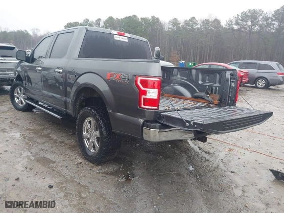 2018 Ford F-150 XL with VIN 1FTEW1E53JFC38812, listed as a IAAI auction lot 41514489 with 112,851 mi miles. Bid and sale history available at carsss.com. Image 3.