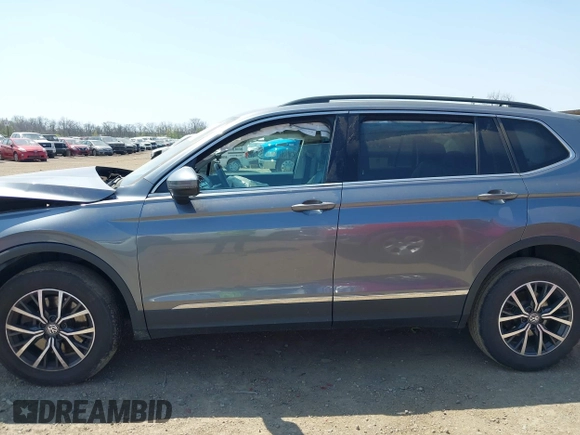 2020 Volkswagen Tiguan SE with VIN 3VV2B7AX4LM074385, listed as a IAAI auction lot 42063842 with 101,092 mi miles and . Bid and sale history available at DreamBid. Image 14.