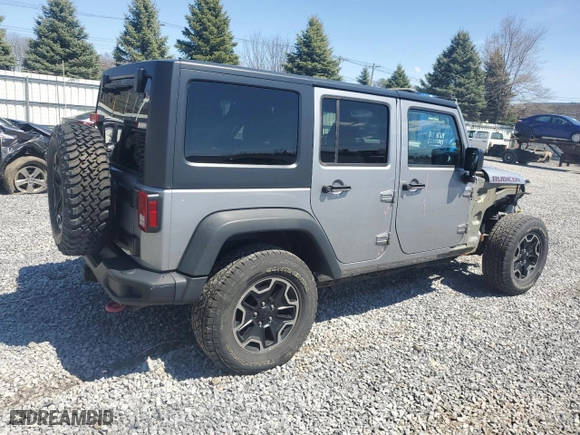 2015 Jeep Wrangler Unlimited Rubicon Hard Rock with VIN 1C4HJWFG2FL686556, listed as a Copart auction lot 54049955 with 126,675 mi miles and Salvage Title. Bid and sale history available at carsss.com. Image 3.