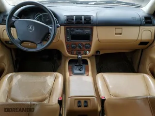 1999 Mercedes-Benz M-Class with VIN 4JGAB54E2XA061500, listed as a Copart auction lot 51301525 with 191,463 mi miles and Salvage Title. Bid and sale history available at carsss.com. Image 8.