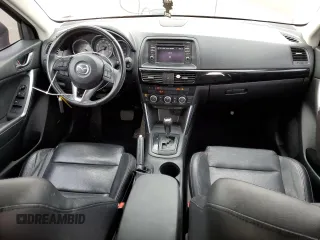 2014 Mazda CX-5 Grand Touring with VIN JM3KE4DY5E0360896, listed as a Copart auction lot 43978975 with 113,942 mi miles and Salvage Title. Bid and sale history available at carsss.com. Image 8.
