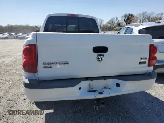 2007 Dodge Dakota SLT z VIN 1D7HE48P77S164721, wystawiony jako Copart lot #49673685 z przebiegiem 218 861 mil mil oraz Szkody całkowita. Historia ofert i sprzedaży dostępna na DreamBid. Obrazek 6.
