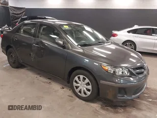 2011 Toyota Corolla L with VIN JTDBU4EE3BJ102060, listed as a IAAI auction lot 42140081 with 125,989 mi miles. Bid and sale history available at carsss.com. Image 1.