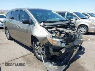 2011 Honda Odyssey EX-L with VIN 5FNRL5H69BB101174, listed as a IAAI auction lot 42564117 with 261,945 mi miles and . Bid and sale history available at DreamBid. Image 1.