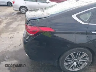 2018 Genesis G80 3.8L with VIN KMHGN4JE0JU246022, listed as a IAAI auction lot 41855219 with 106,277 mi miles. Bid and sale history available at carsss.com. Image 19.
