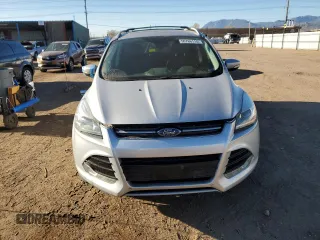 2014 Ford Escape Titanium with VIN 1FMCU9J9XEUB10861, listed as a Copart auction lot 50766115 with 134,469 mi miles and Salvage Title. Bid and sale history available at DreamBid. Image 5.