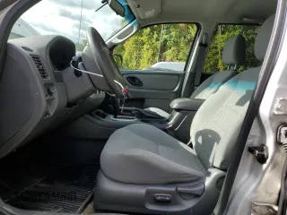 2006 Ford Escape XLT with VIN 1FMYU93156KD49857, listed as a Copart auction lot 73610184 with 123,339 mi miles and Salvage Title. Bid and sale history available at carsss.com. Image 7.